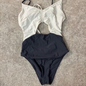 Tularosa Black and White One Piece Swimsuit with Cut-Out Design